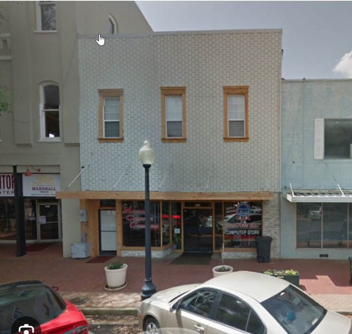 A street view of a building

Description automatically generated