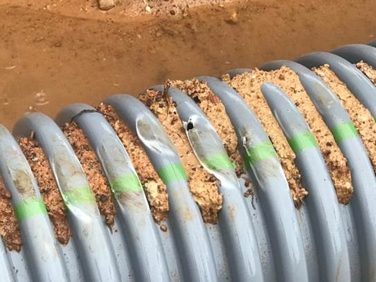 A close up of a pipe

Description automatically generated