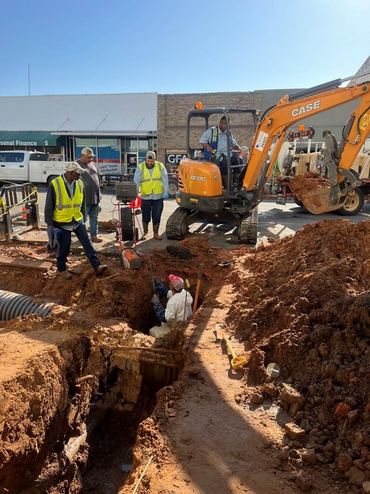 A construction workers in a pit

Description automatically generated with medium confidence