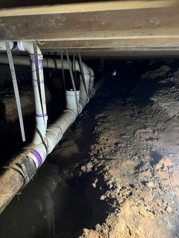 Pipes in a basement

Description automatically generated